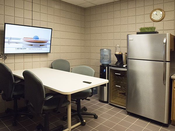 Private food storage and wide screen TV in Kitchenette